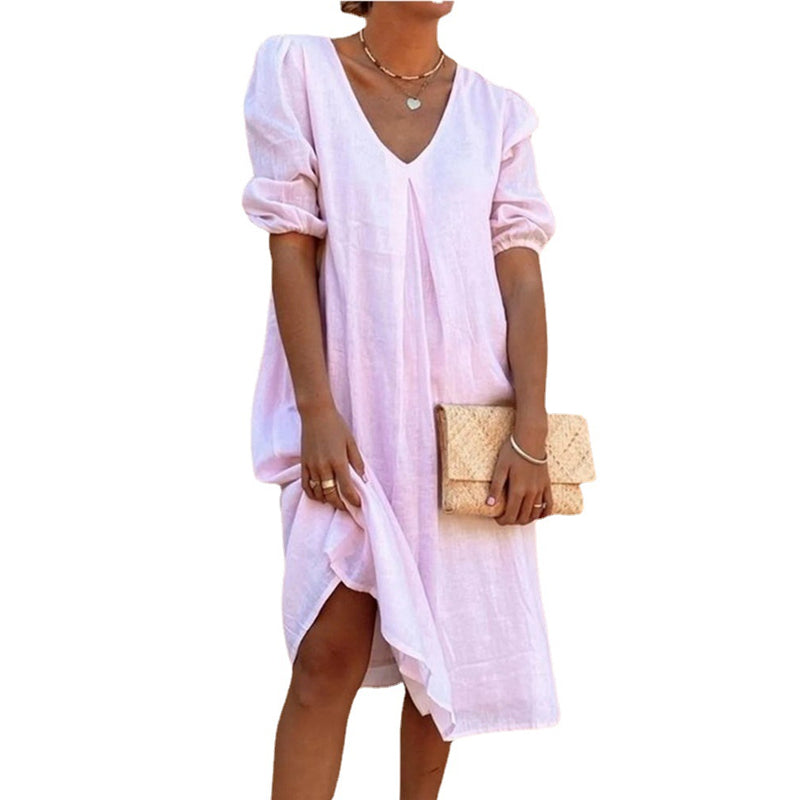 Solid color V-neck dress with lateral sleeves